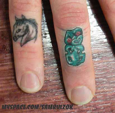The Pony and the Tiki finger tattoos are courtesy of ouchiscool