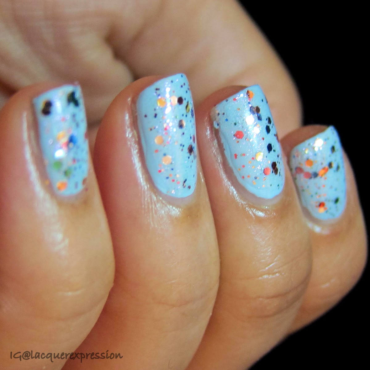 swatch of glitterbomb nail polish by orly