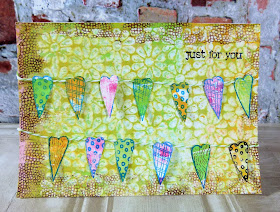 Close up of fabric hearts bunting card