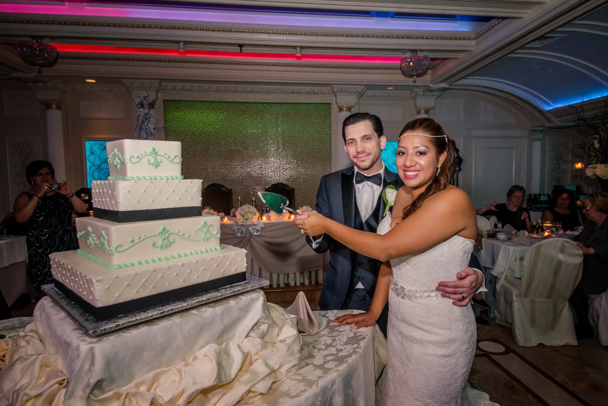 Couple Cutting The Cake