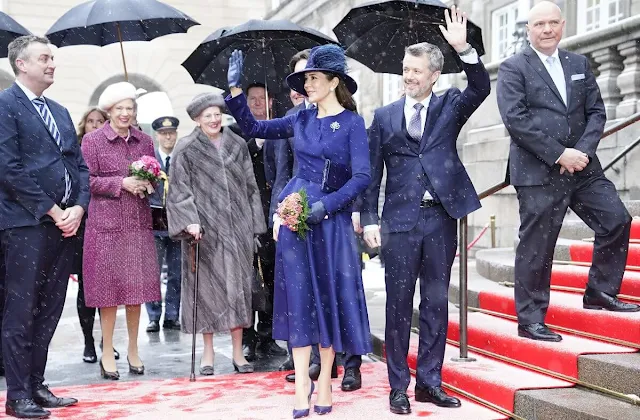 Queen Mary wore a royal blue outfit, jacket and skirt, by Birgit Hallstein, diamond and pearl brooch