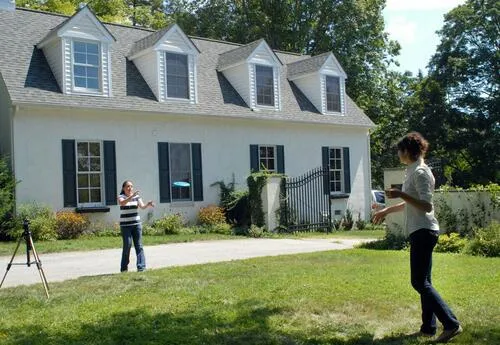 Reporters play frisbee outside Joe Biden’s home in Wilmington, Del., in 2008.