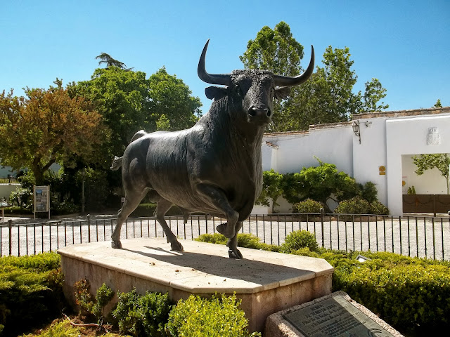 Bull statue at Plaza de Toros in Ronda on Semi-Charmed Kind of Life