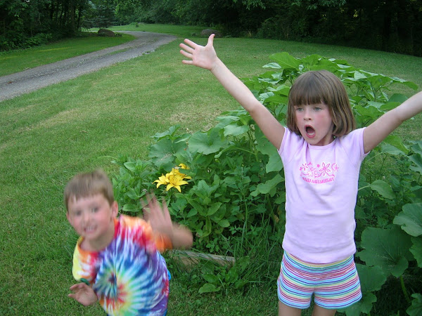 The sunflowers are as big as Izzy