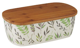 white bread bin with pattern of leaves