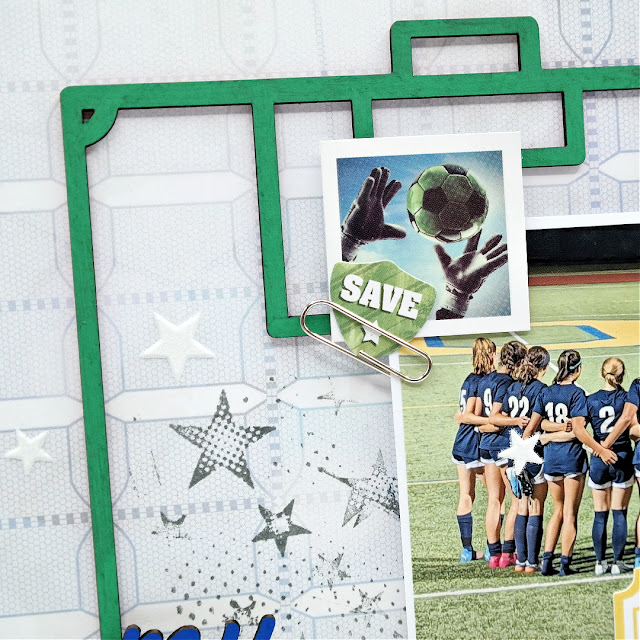 Chipboard soccer field frame on a soccer scrapbook layout.