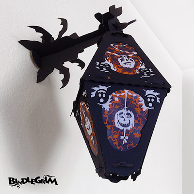 Eight sided vintage-style paper lantern hangs on Bindlegrim wall pole for gothic interior Halloween decor for 2014