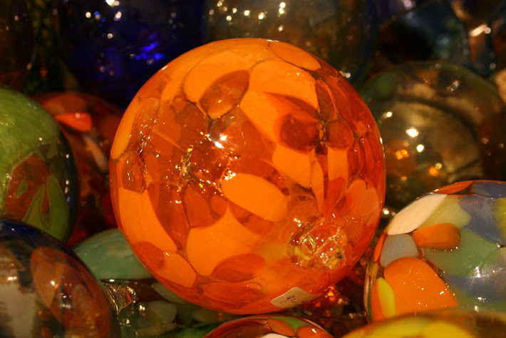 orange coloured glass sphere