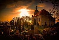 Church graveyard - Photo by Martin Vysoudil on Unsplash