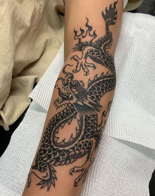 Japanese-forearm-black-ink-dragon-tattoo