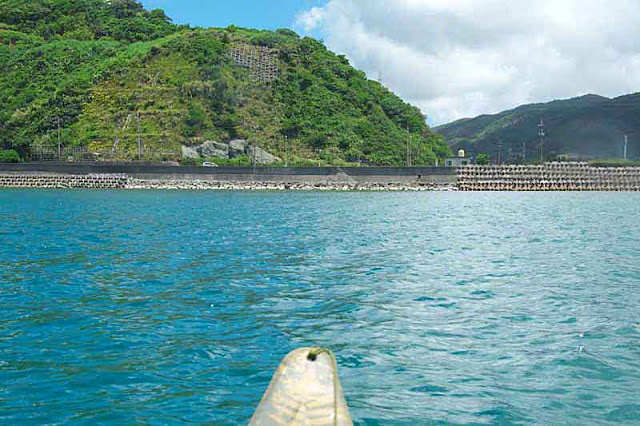 Canoe heading back to Genka, Okinawa