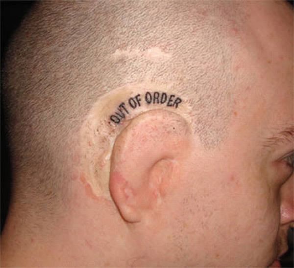 behind ear tattoo. The Craziest Ear Tattoos