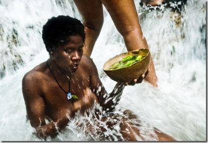 woman-cleaning-waterfall-herbs-haiti woman-cleaning-waterfall-herbs-haiti