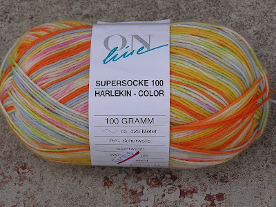 online supersocke yarn ball in orange and yellow