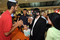 Israelis collect gas masks