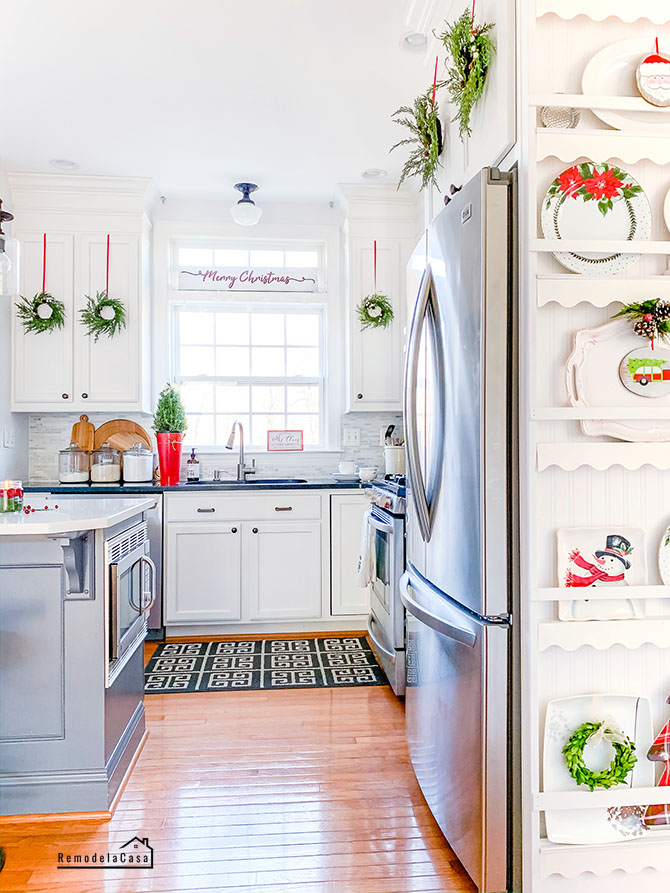 Red, white and green holiday decor in the kitchen