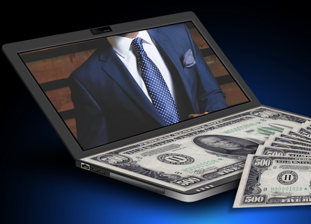 Gambar laptop dan uang