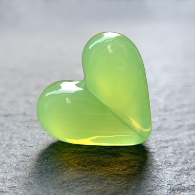 Handmade lampwork glass heart bead by Laura Sparling made with CiM Witches' Brew