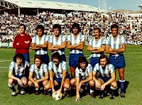 C. D. MÁLAGA - Málaga, España - Temporada 1975-76 - Palomo, Aráez, Uriarte, Irles, Migueli y Macías; Quevedo, Esteban, Orozco, Vilanova y Aicart - El C. D. MÁLAGA, con Milorad Pavic de entrenador, se clasificó 3º en la Liga de 2ª División, ascendiendo a 1ª