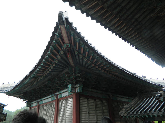 Graceful inclines of the palace roofs