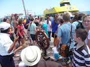 . got on a ferry, and rode to Isla De La Mujeres (Island of the Women).