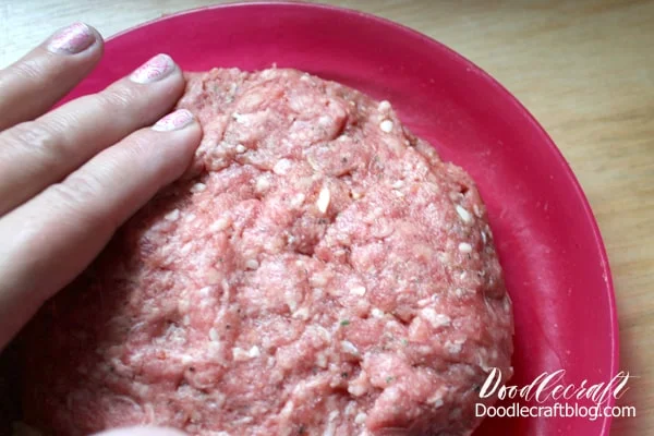 Gently press the top so there are no seams...this will keep the blue cheese totally encased during cooking.