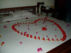 flower petals on bed in Kerala 