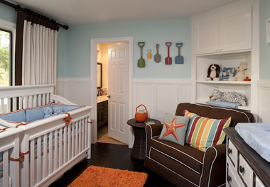 This darling beach inspired nursery for twin boys was designed by Little