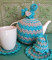 http://www.ravelry.com/patterns/library/tea-cosy-coaster-egg-cosy-set-with-bird