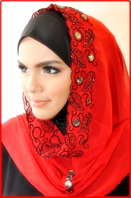 Model jilbab  terbaru warna  merah untuk wanita modern