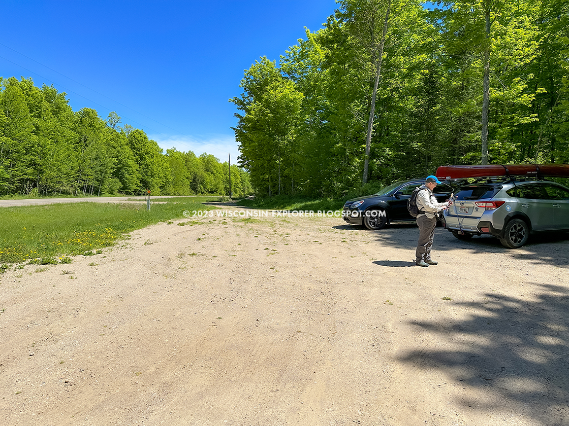 gravel lot beside highway