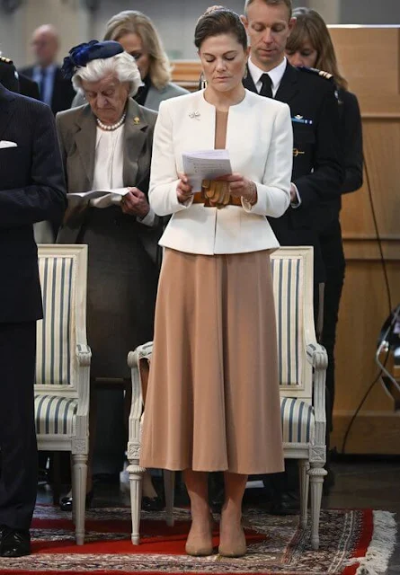 Crown Princess Victoria wore a kiana caramel beige blouse by Andiata. Andiata Sea caramel beige skirt. Charlotte Bonde earrings