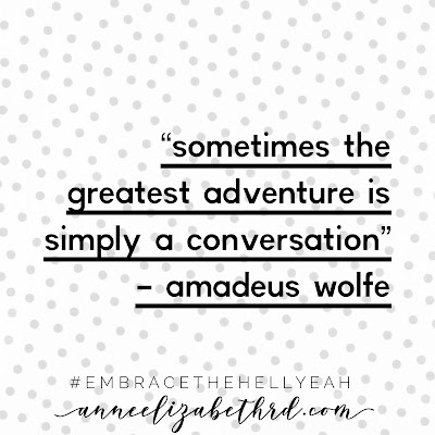 Inspiration quote in black letters with a white background with grey polka dots saying "sometimes the greatest adventure is simply a conversation" by Amadeus Wolfe