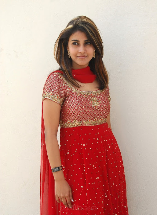 kausha rach in red dress