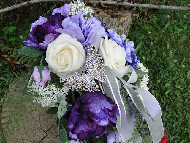 purple and white wedding bouquet with silk flowers the Camellia