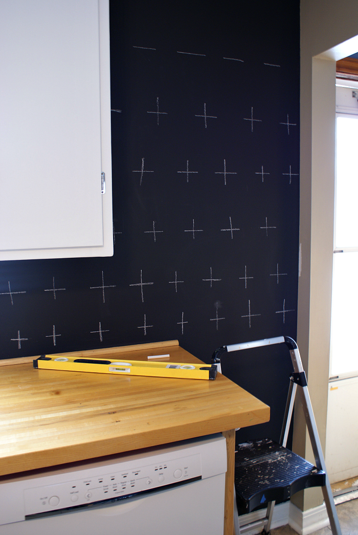 Budget kitchen update. Chalkboard paint back splash with plus signs. Butcher block counter tops