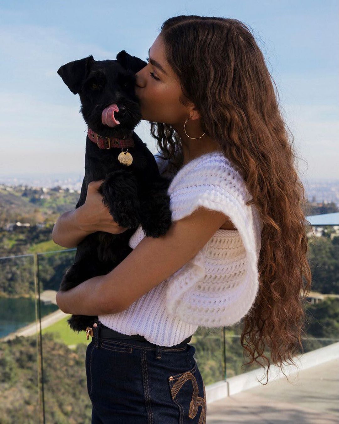 Zendaya kissing her dog