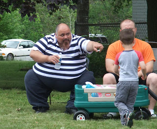 the hamburgler, fat, pointing at candy, kids, chair