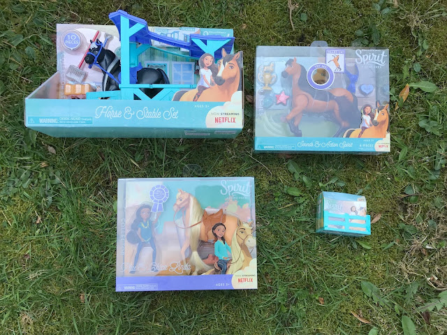 four spirit riding free toys still in  packaging 