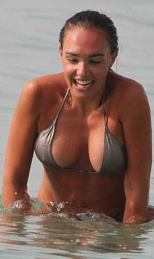 Tamara's bikini struggled to contain her ample cleavage