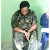 Fake soldier meets her waterloo in Abuja as she was caught with 3 kids with bombs tied around them