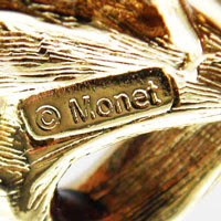 monet signature on brooch