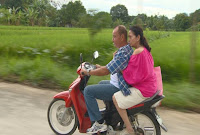 Gina Pareño and Dante Rivero on a motorcycle ride