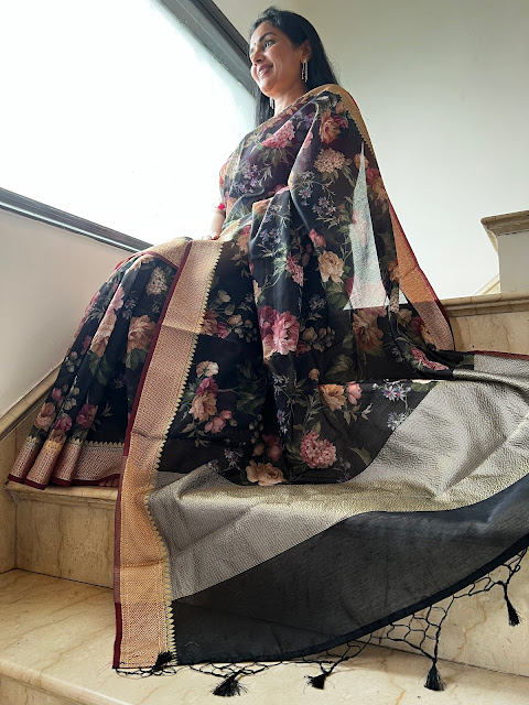 Elegance in Full Bloom: The Black Floral Pashmina Silk Saree with Zari Border