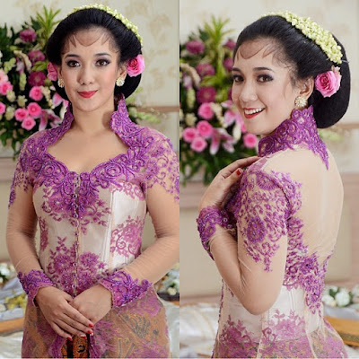 kebaya pernikahan broklat ungu dengan rok batik