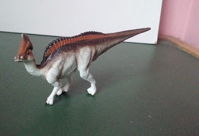 Miniatura de vinil estática , marca Procon  de dinossauro  15cm de comprimento R$ 12,00