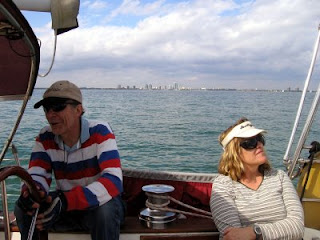 Paul and Honey sailing on Biscayne Bay, with Coconut Grove and Dinner Key in the distant background