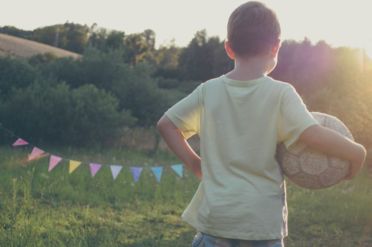 A child holding a ball