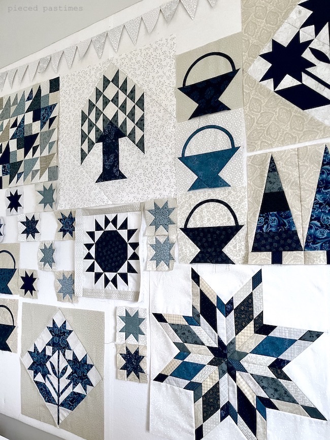 Progress of Patches of Blue on the Design Wall at Pieced Pastimes