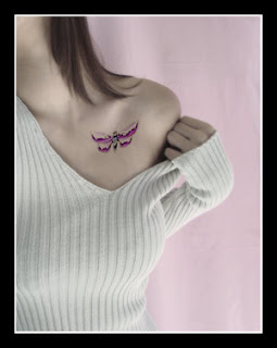 Female Chest tattoo With Butterfly Tattoo Design 1